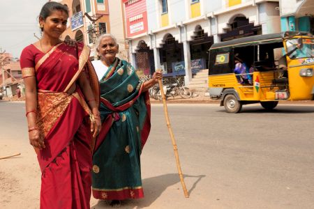 Faces of India: A blind woman being lead